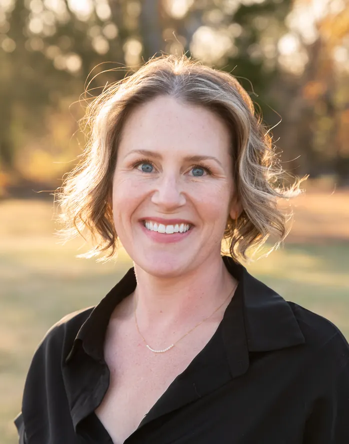 Dr. Caitlin Hulver smiling outdoors